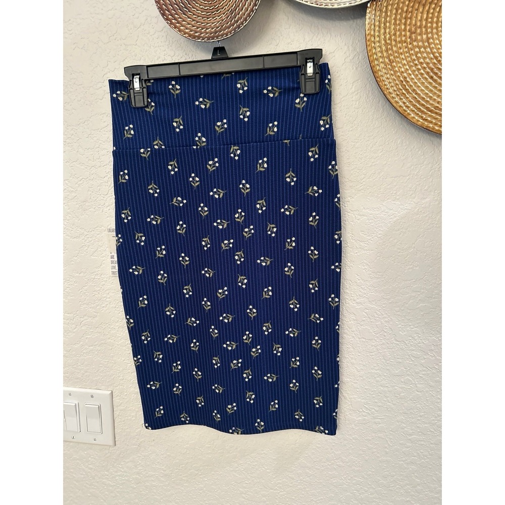 LuLaRoe Cassie midi pencil skirt featuring a navy blue and white flowers size XS